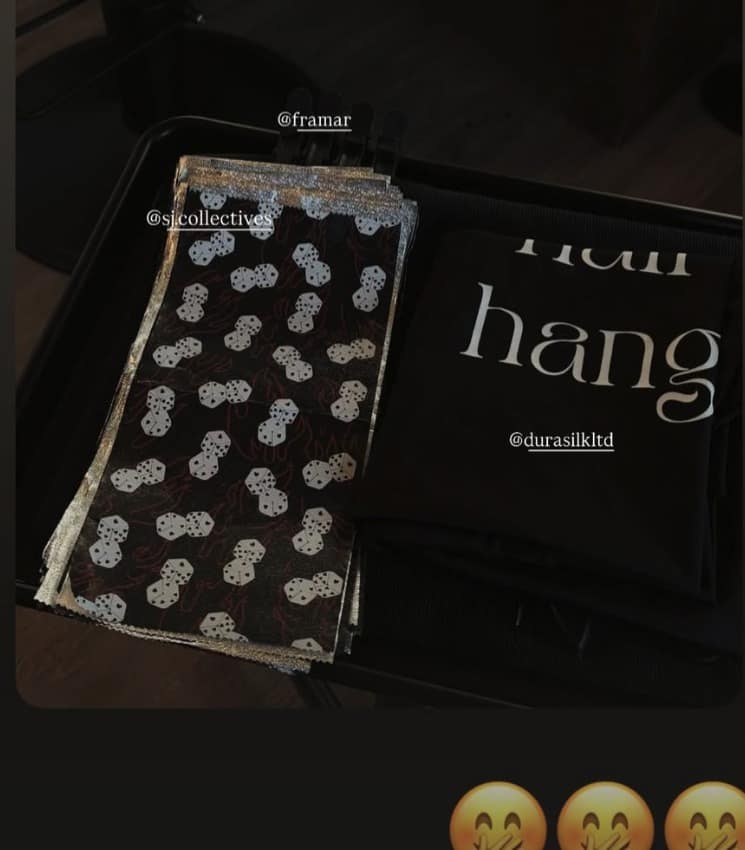 Hair and Hangout branded salon gear staged at the styling station